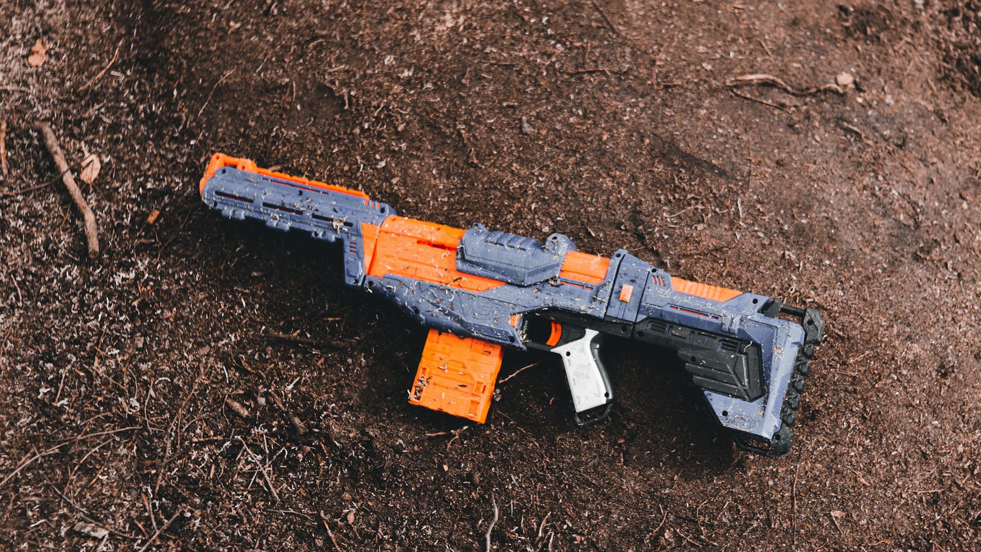 Toy Pistol on Ground by Erik Mclean (Unsplash)